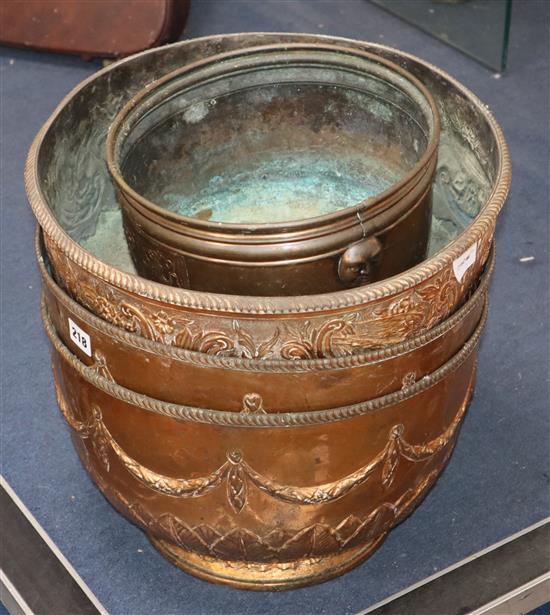 Four embossed copper bowls